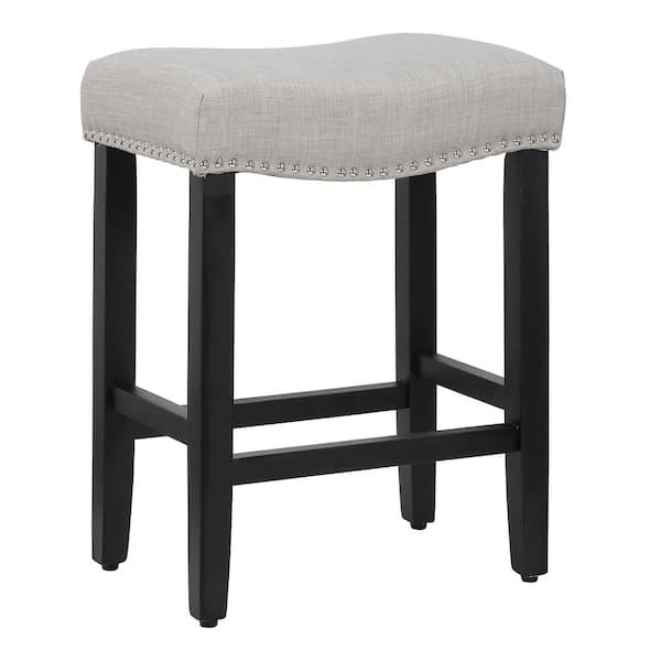 WESTINFURNITURE Jameson 24 in. Counter Height Black Wood Backless Nailhead Trim Barstool with Upholstered Gray Linen Saddle Seat