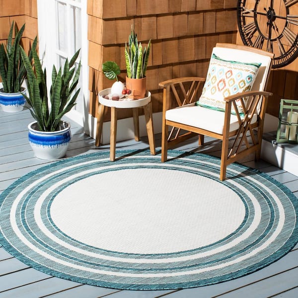 Courtyard Ivory/Teal 9 ft. x 9 ft. Solid Color Striped Indoor/Outdoor Round Area Rug