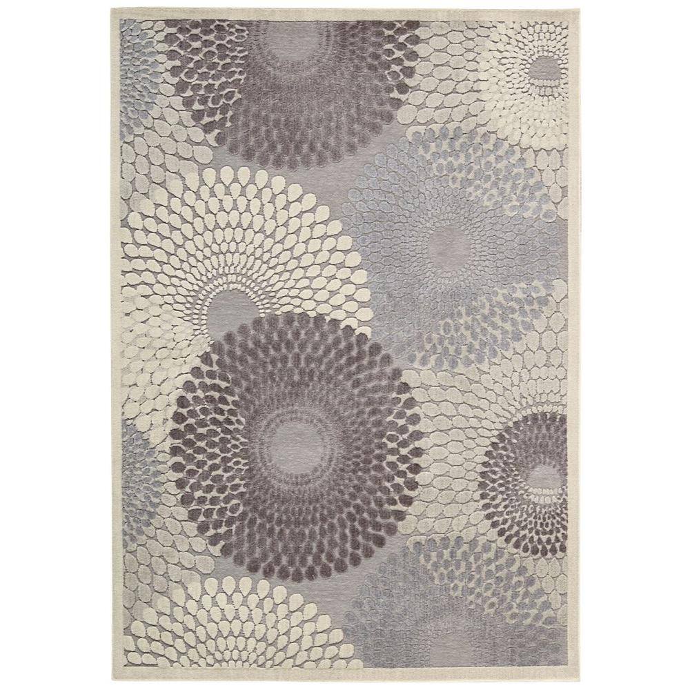 Nourison Graphic Illusions Grey 8 ft. x 11 ft. Geometric Modern Area Rug Complete any floor with this Nourison Graphic Illusions 8 ft. x 11 ft. Area Rug. This rug is intricately made with a geometric pattern, displaying modern, crisp, clean lines. It is multi-colored, adding to your unique design. Made from 70% acrylic, it will be an extremely long-lasting option for your room. Color: Grey.