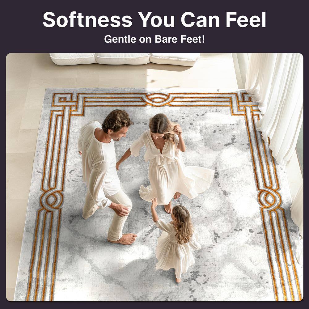 Ivory Abstract Easy-Care Stain-Resistant Synthetic Area Rug 5' x 7'