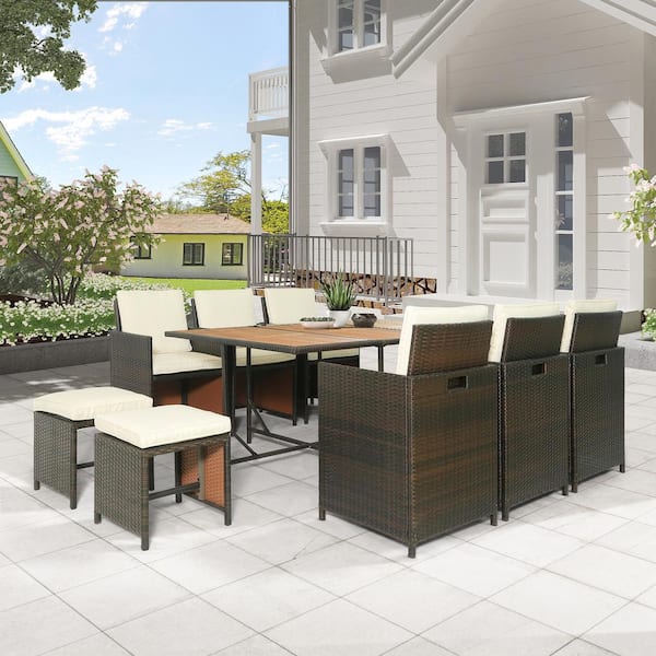 Boosicavelly 11-Piece PE Wicker Patio Outdoor Dinner Table Set with Beige Cushion