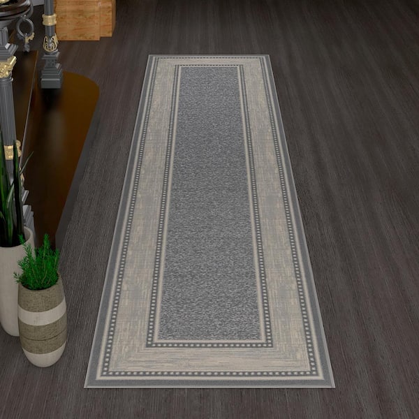https://images.thdstatic.com/productImages/89684183-73e8-4ab6-875d-d83599385665/svn/2203-gray-ottomanson-area-rugs-oth2203-3x10-fa_600.jpg