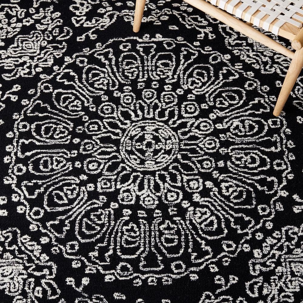 Black and Ivory Floral Hand-Tufted Wool 6' x 9' Area Rug