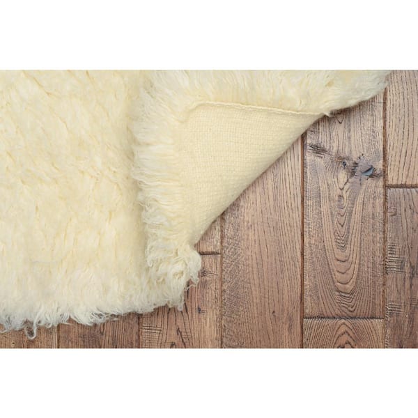 5A Flokati Natural 6 ft. x 9 ft. Area Rug