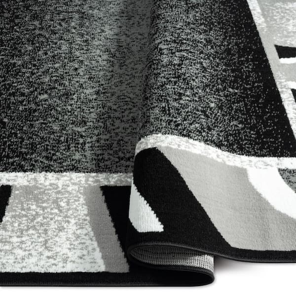 https://images.thdstatic.com/productImages/898b8b54-c50a-41a6-8701-d2a20deacb43/svn/black-grey-home-dynamix-rug-sets-3s-7542-480-1f_600.jpg