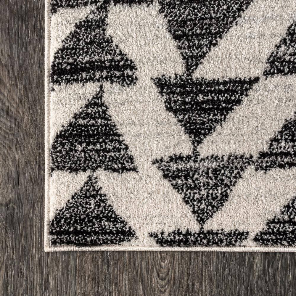 Aisha Cream and Black Geometric Synthetic Area Rug