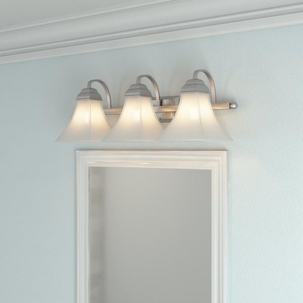 https://images.thdstatic.com/productImages/89c2ce31-20bb-4423-88f6-f1b78e1ecdf0/svn/brushed-nickel-hampton-bay-vanity-lighting-73958-hd-g2-e1_600.jpg