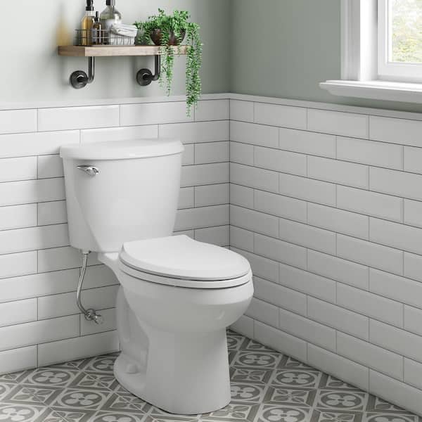 American Standard Reliant Two-Piece 1.28 GPF Single Flush Elongated Standard Height Toilet with Slow-Close Seat in White