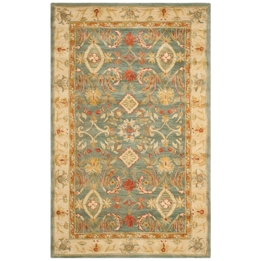 Handmade Light Blue and Ivory Floral Wool 6' x 9' Area Rug