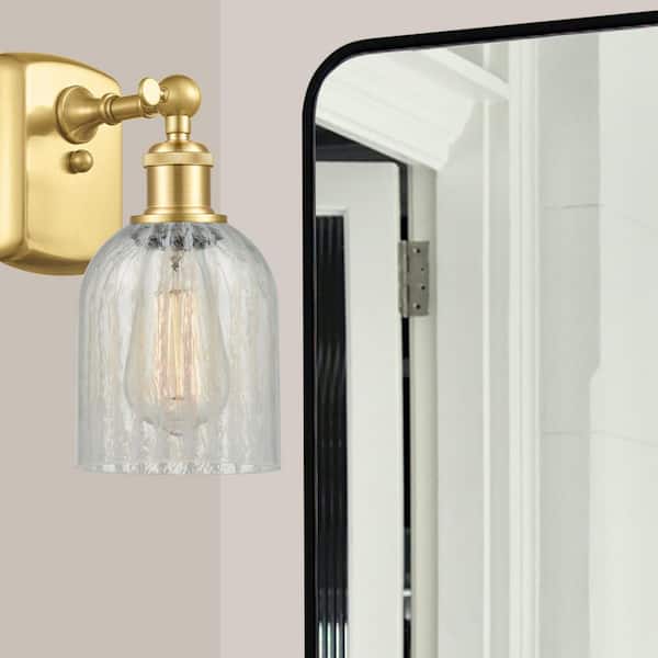 Caledonia 1-Light Gold Wall Sconce with Clear Glass Shade