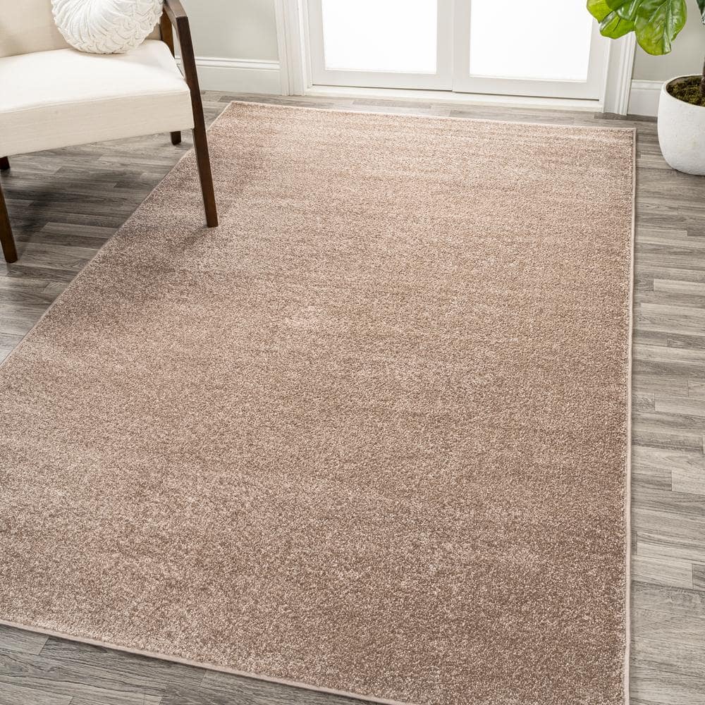 Beige 12' x 15' Solid Synthetic Low-Pile Area Rug
