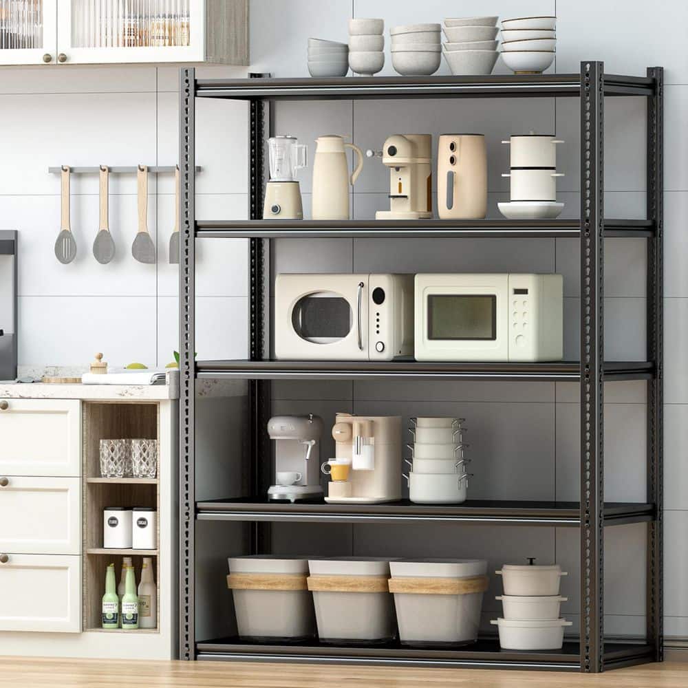 A black 5-tier garage shelving unit used in a kitchen to hold appliances and dishes.