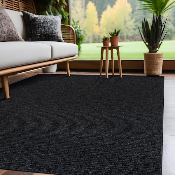 Oasis Solid Dark Gray 5 ft. x 7 ft. Non-Slip Rubber Back Indoor Area Rug