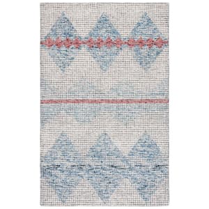 Abstract Ivory/Blue 6 ft. x 9 ft. Aztec Tile Area Rug