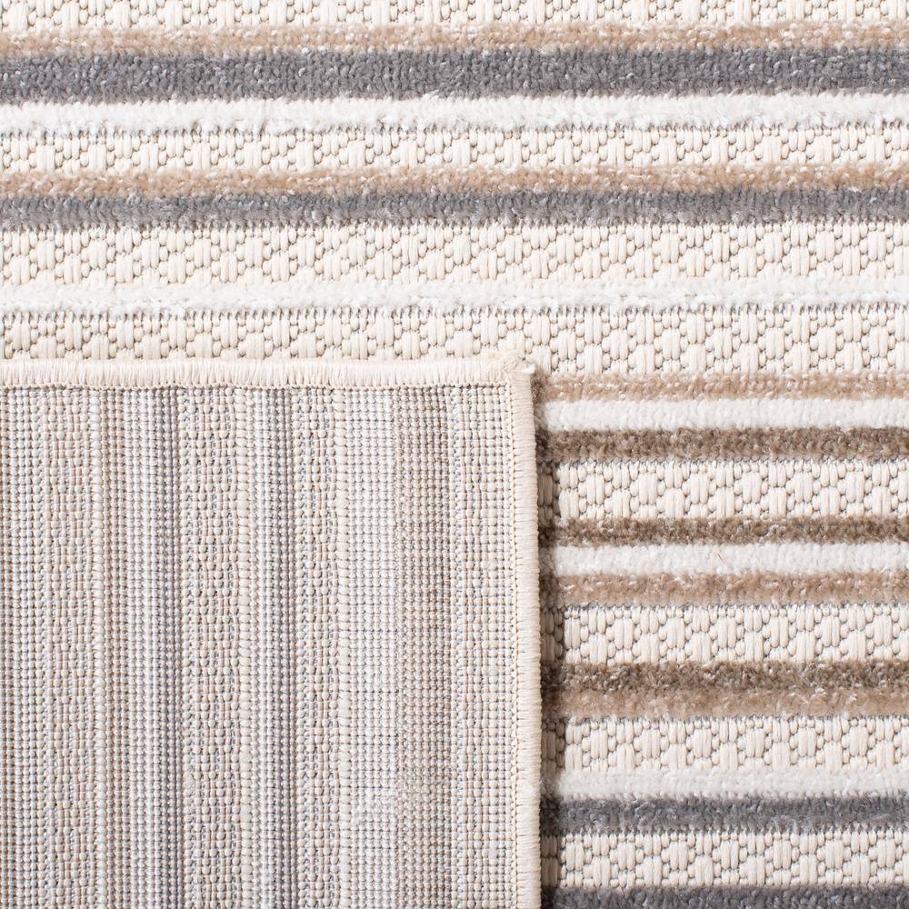 Ivory and Grey Geometric Reversible Synthetic Area Rug - 4'5" x 6'5"