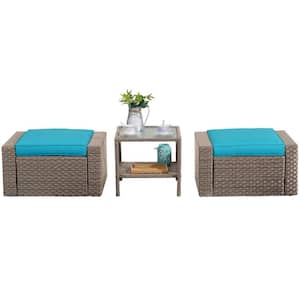 Brown Wicker Outdoor Ottoman with Blue Cushion and Glass Coffee Table (3-Piece)