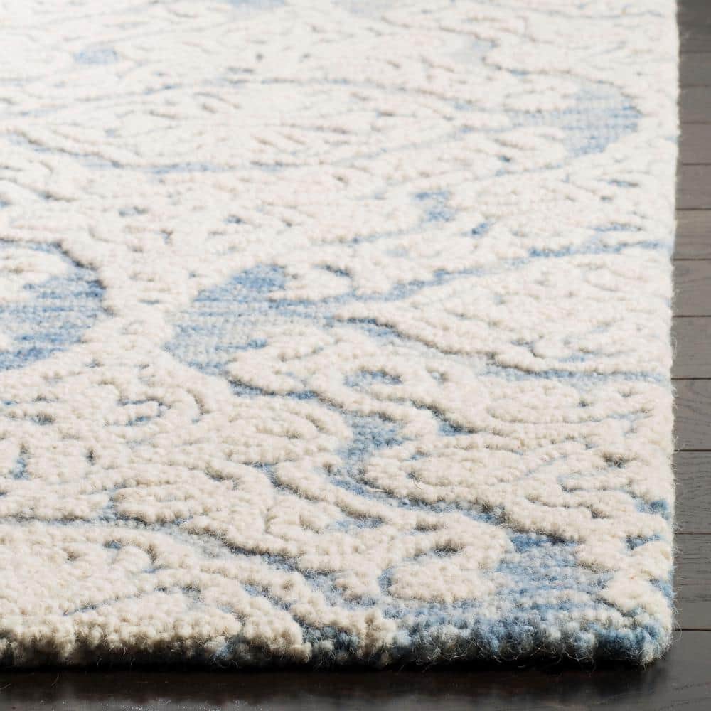 Handmade Blue Ivory Wool Floral 8' x 10' Area Rug