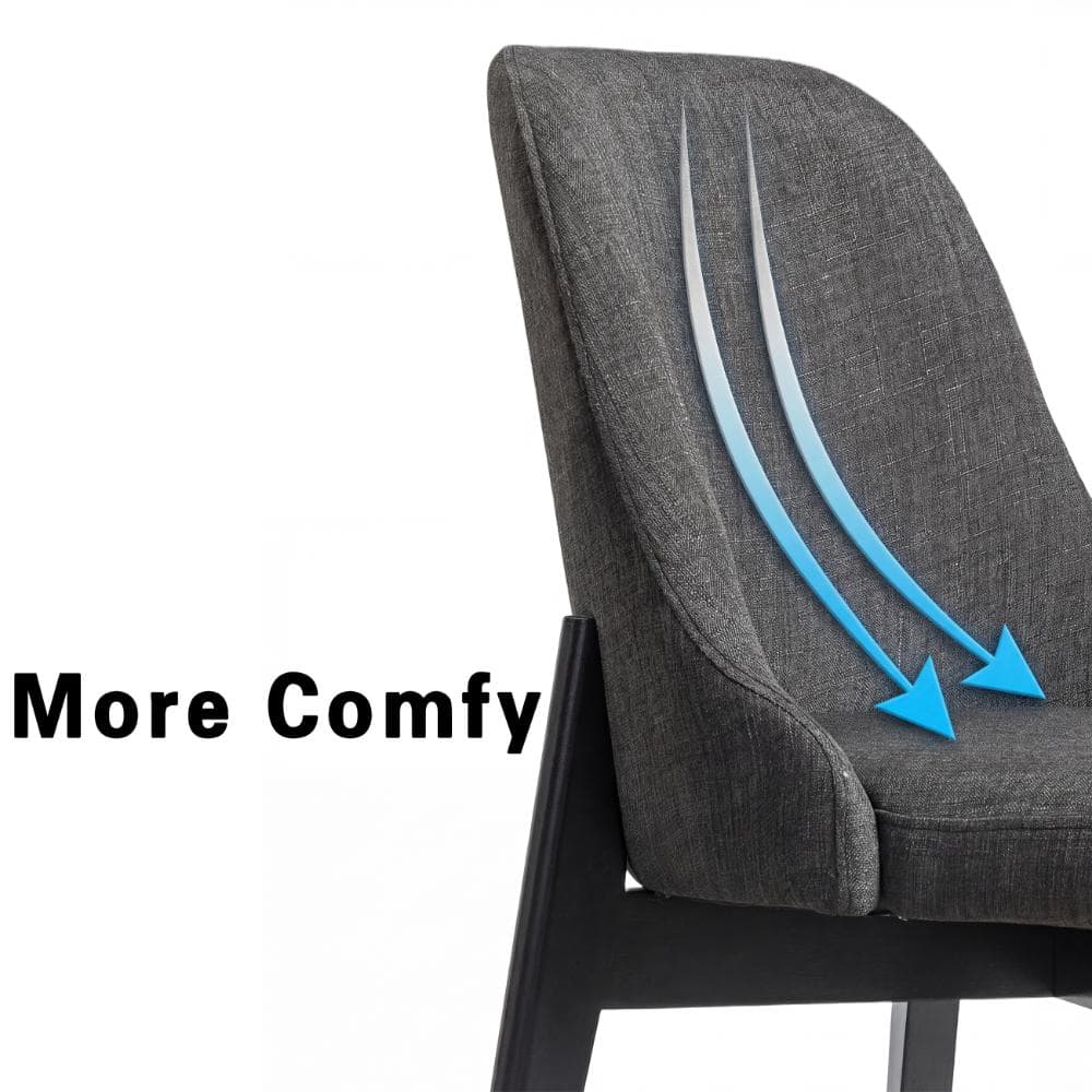 Close-up of the curved backrest of a dark gray upholstered chair.