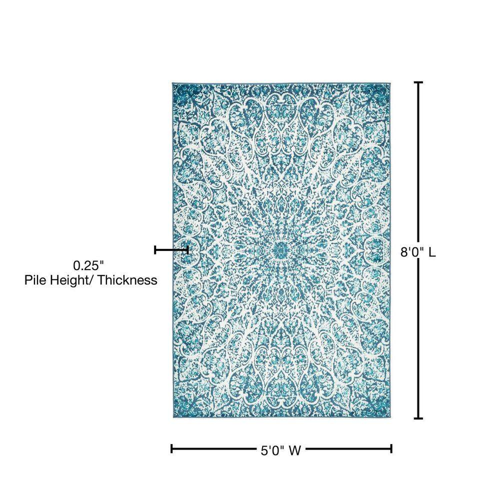 Turquoise and Ivory Geometric Synthetic Area Rug