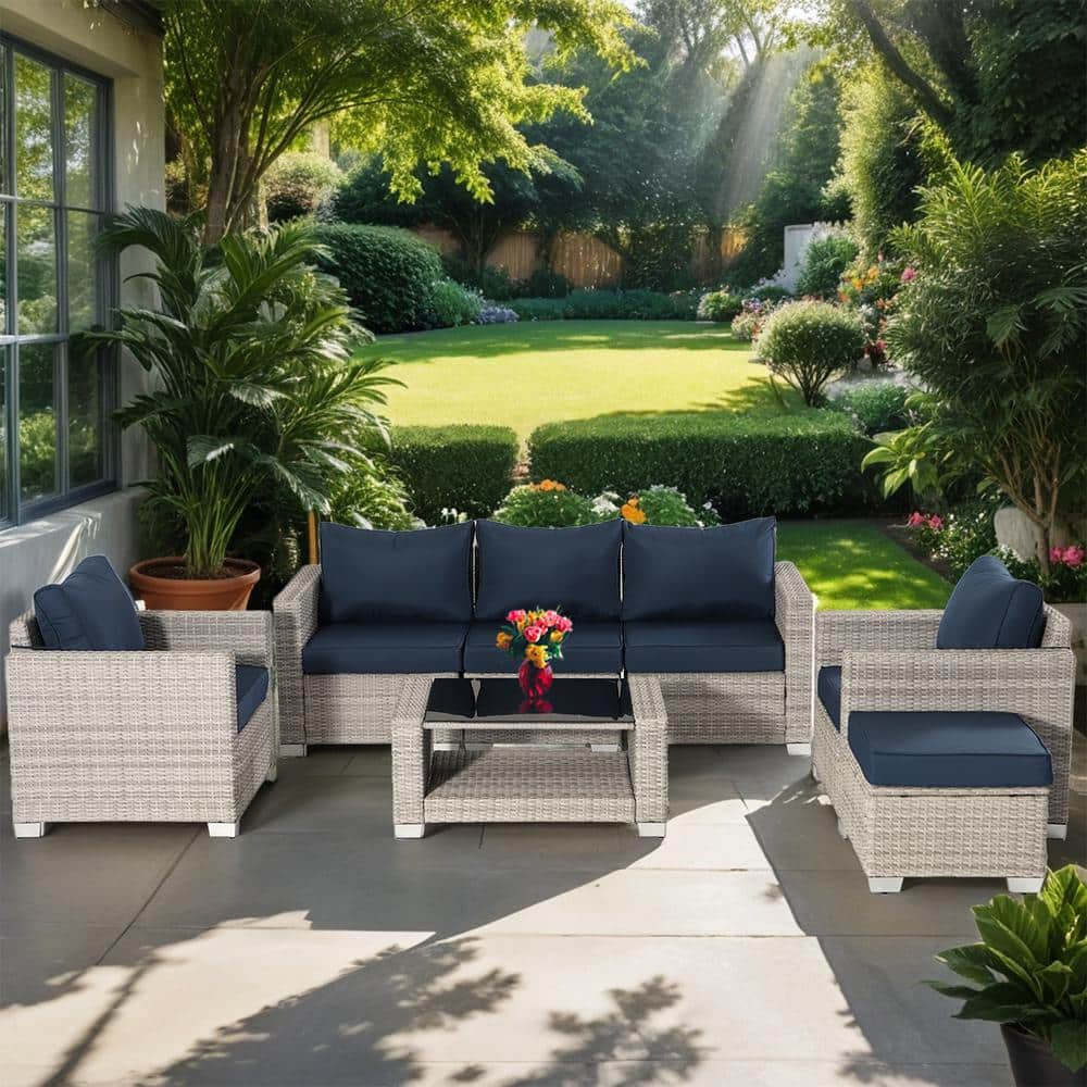 Gray7-Piece Wicker Outdoor Sectional Set with Dark Blue Cushions and Table