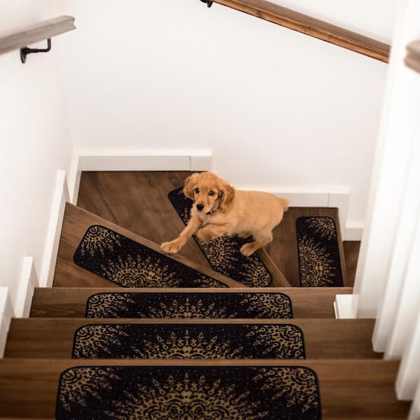 https://images.thdstatic.com/productImages/8a6a157c-8bda-4367-b417-fe658efcef53/svn/black-beverly-rug-stair-tread-covers-hd-trd10345-8pk-44_600.jpg