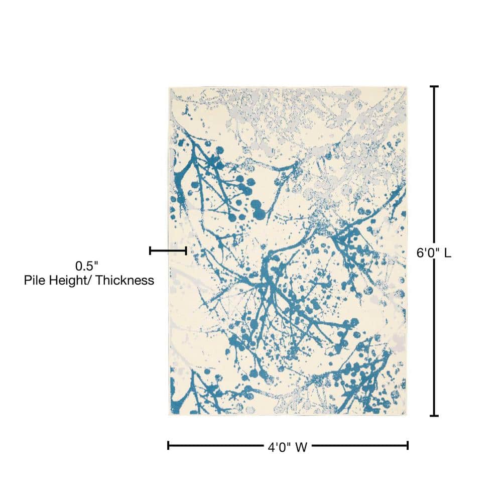 Ivory and Blue Abstract Synthetic 4' x 6' Easy-Care Area Rug
