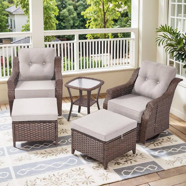Henn Brown Rattan 5-Piece Outdoor Conversation Set with Beige Cushions, 2 Swivel Glider Chairs, 2 Ottomans, 1 Side Table