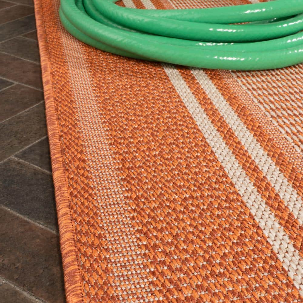 Haynes 3' x 5' Orange and Cream Synthetic Stripe Area Rug