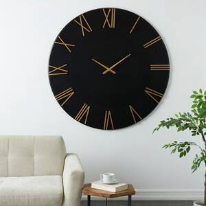 Black Metal Wall Clock with Gold Hands and Numbers