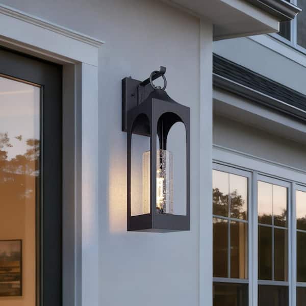 Modern 1-Light Black Dusk to Dawn Outdoor Wall Light Sconce with Seeded Glass