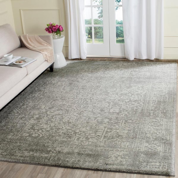 Evoke Silver/Ivory 8 ft. x 10 ft. Distressed Border Medallion Area Rug