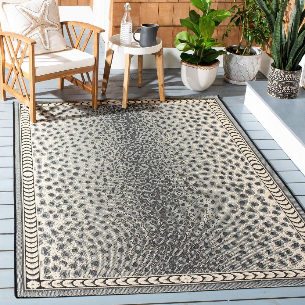 Gray and Black Spotted Synthetic Indoor/Outdoor Area Rug, 9' x 12'