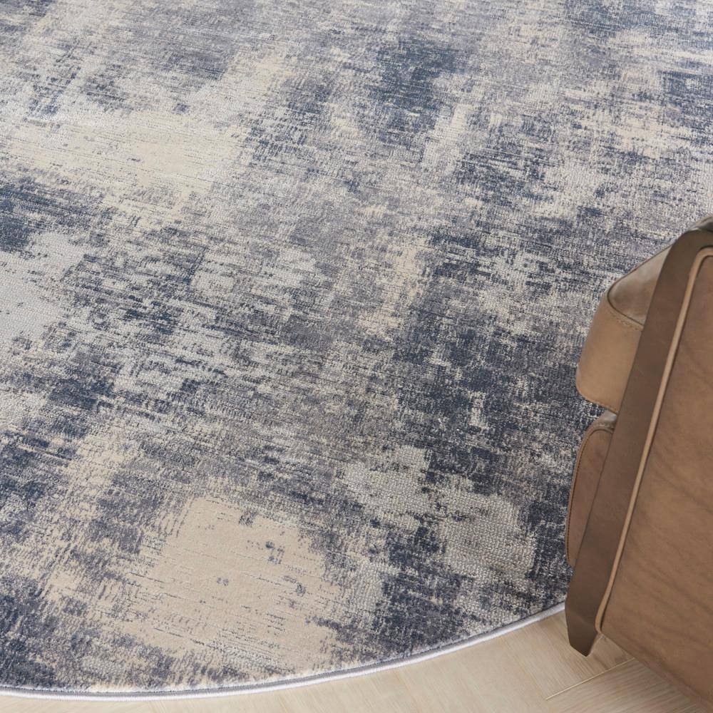 Round Blue and Ivory Abstract Area Rug 7'10"