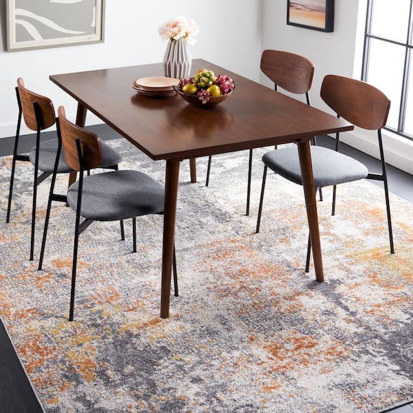 Aston 10 ft. x 14 ft. Gray/Gold Distressed Geometric Area Rug