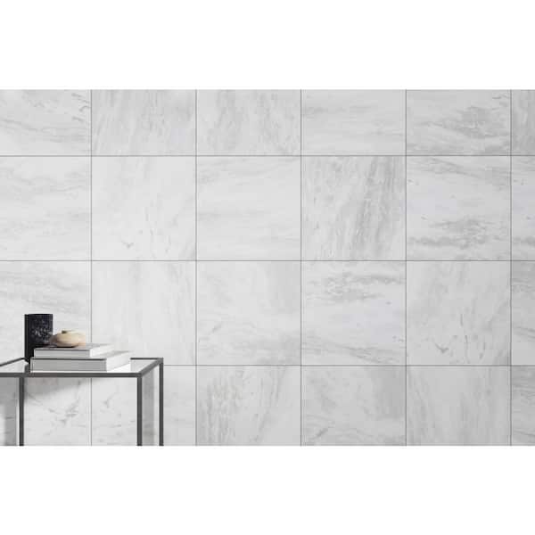 https://images.thdstatic.com/productImages/8abc6421-1227-4c5e-8251-9d67f7a753bb/svn/white-emser-tile-marble-tile-1653901-e1_600.jpg