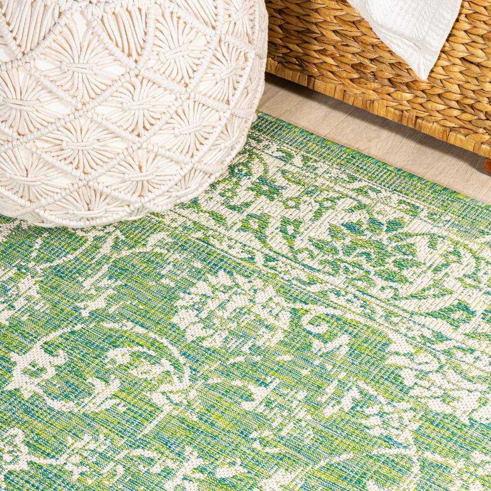 9' x 12' Green and Cream Floral Synthetic Rectangular Area Rug