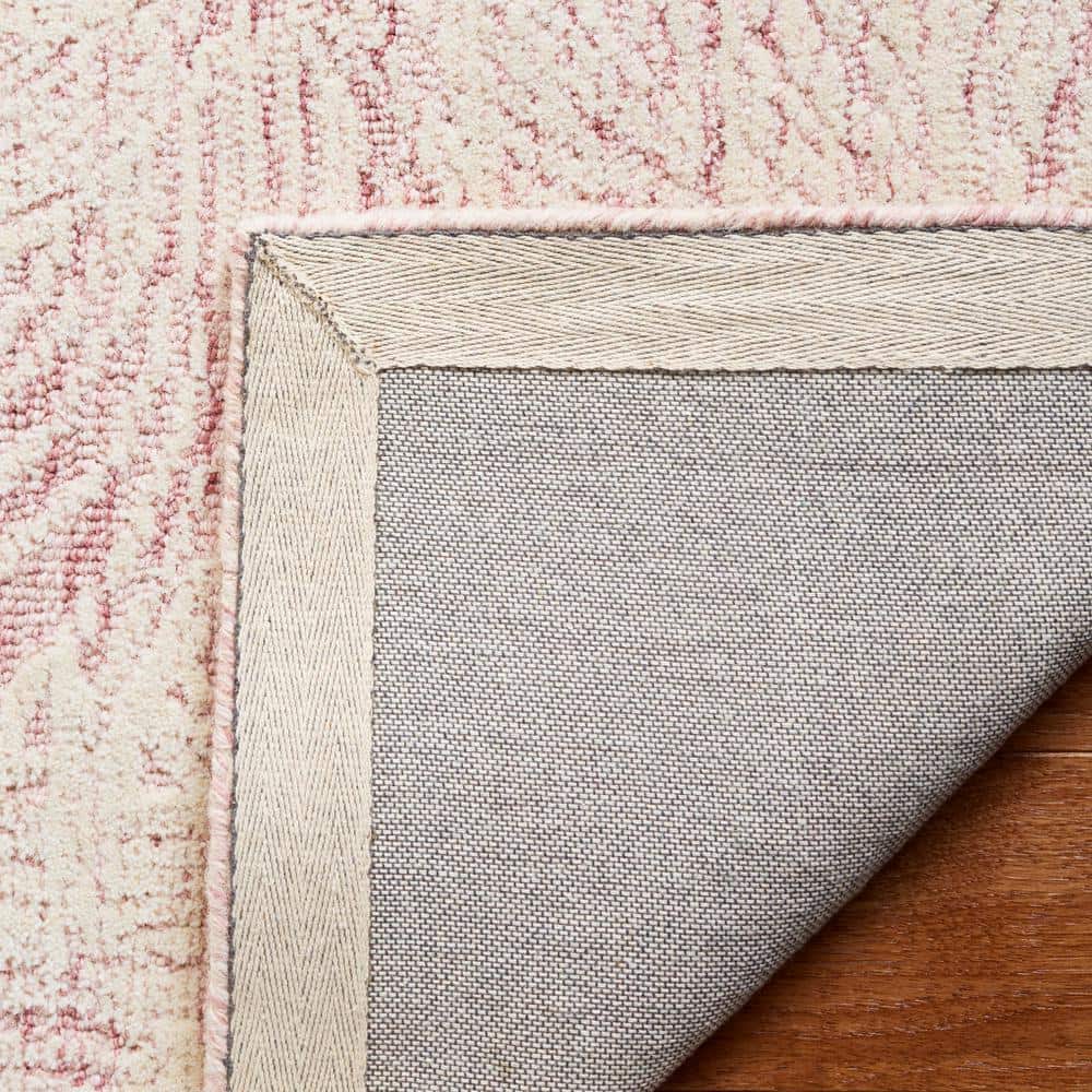 Handmade Pink and Ivory Wool Tufted Rectangular Area Rug