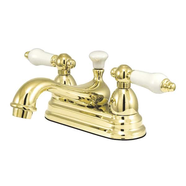 Kingston Brass Restoration 4 in. Centerset 2-Handle Bathroom Faucet with Brass Pop-Up in Polished Brass