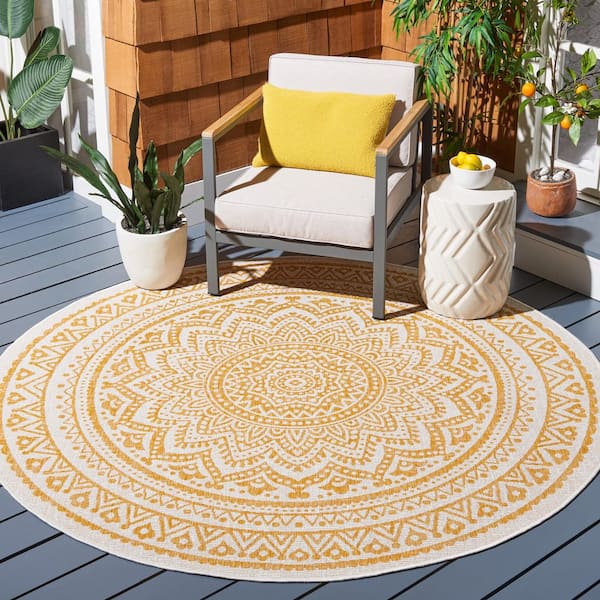Courtyard Ivory/Gold 7 ft. x 7 ft. Medallion Indoor/Outdoor Round Area Rug