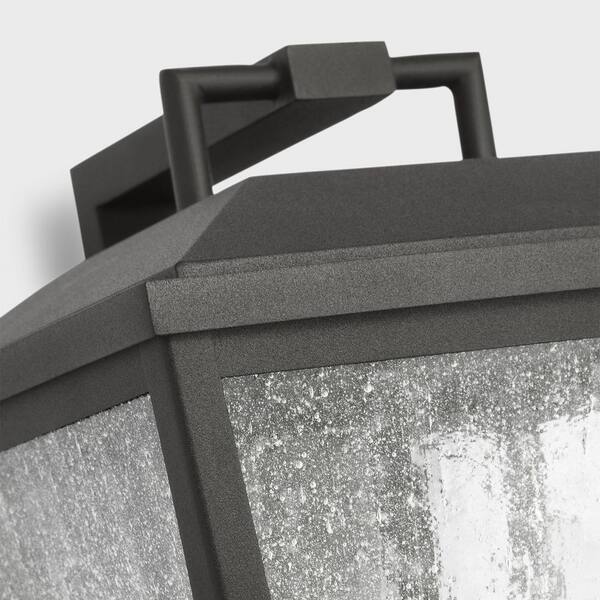 SCOTT LIVING - Kennewick 9 in. W x 13.75 in. H 2-Light Textured Black Outdoor Wall Lantern with Distressed Seeded Glass Shade