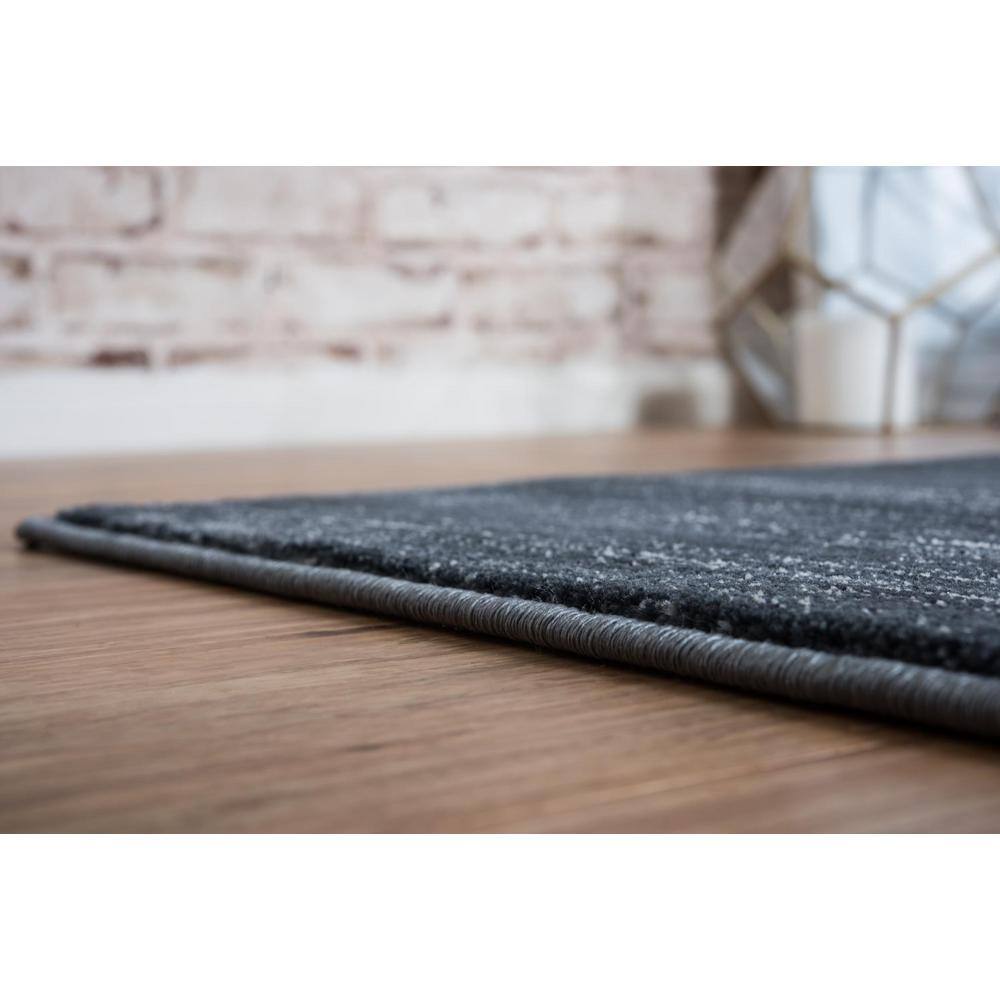 Navy Blue and Ivory 9' x 12' Easy-Care Synthetic Area Rug