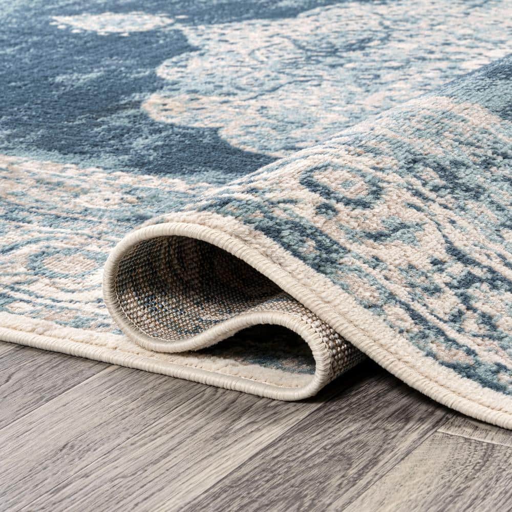Ivory and Blue Medallion 8' x 10' Synthetic Area Rug