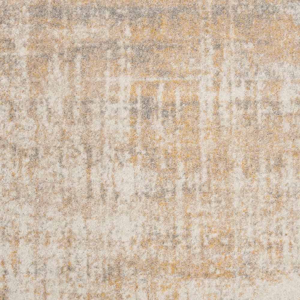 Creme and Gold Abstract Synthetic Area Rug 4' x 6'
