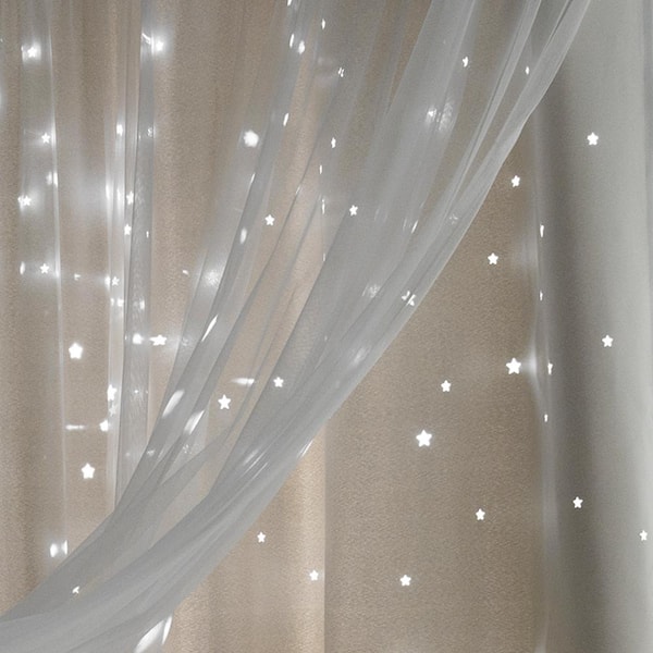 Ivory Grommet Overlay Blackout Curtain - 52 in. W x 63 in. L (Set of 2)