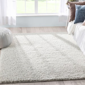 Elle Basics Emerson Solid Shag Ivory 3 ft. 11 in. x 5 ft. 3 in. Area Rug