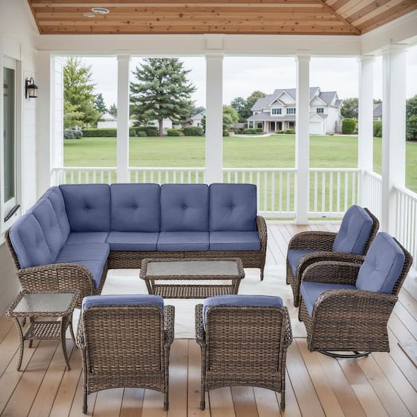 Carlos 8-Piece Brown Wicker Patio Conversation Set with Blue Cushions Swivel Chairs, Patio Chairs and Coffee Table
