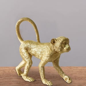 Gold Polyresin Standing Monkey Accent Figurine with Fur Like Texture