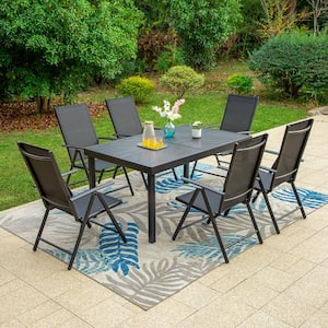 7-Piece Metal Outdoor Dining Set with Extensible Rectangular Carve Pattern Table and Black Folding Chairs