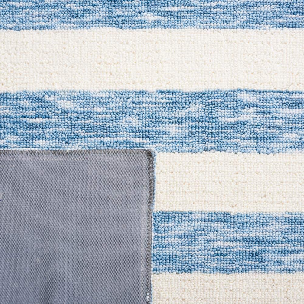 Light Blue and Ivory Striped Synthetic 4' x 6' Area Rug