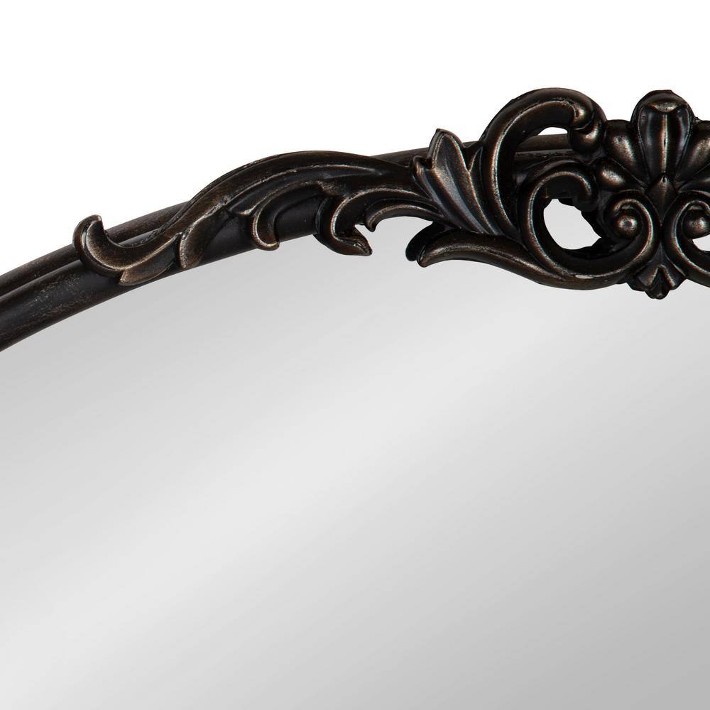 Black Oval Wood Wall Mirror with Intricate Overlay